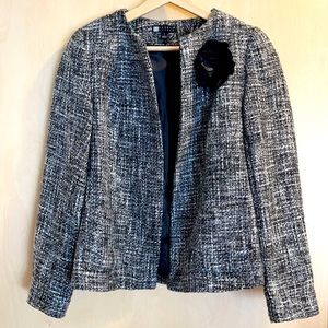 Tweed blazer with Camellia pin